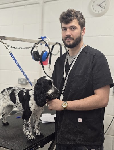 Coat and Clippers Dog Groomers